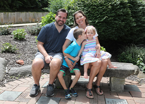 family posing for a photo